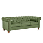 Divano Chesterfield in velluto da 74,5" con bottoni capitonné, braccioli arrotolati, gambe tornite e design elegante